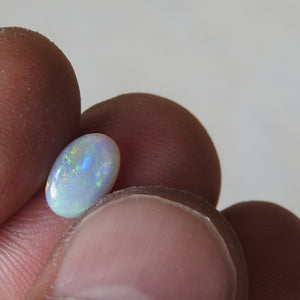 Lightning Ridge Solid Natural Opal with Orange Green Blue colors.