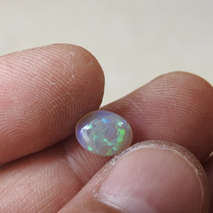Lightning Ridge Solid Opal with Green Blue Colors.